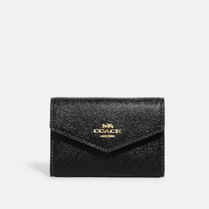 black coach card case